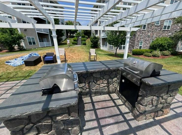 Modular barbecue station with dual grill integration